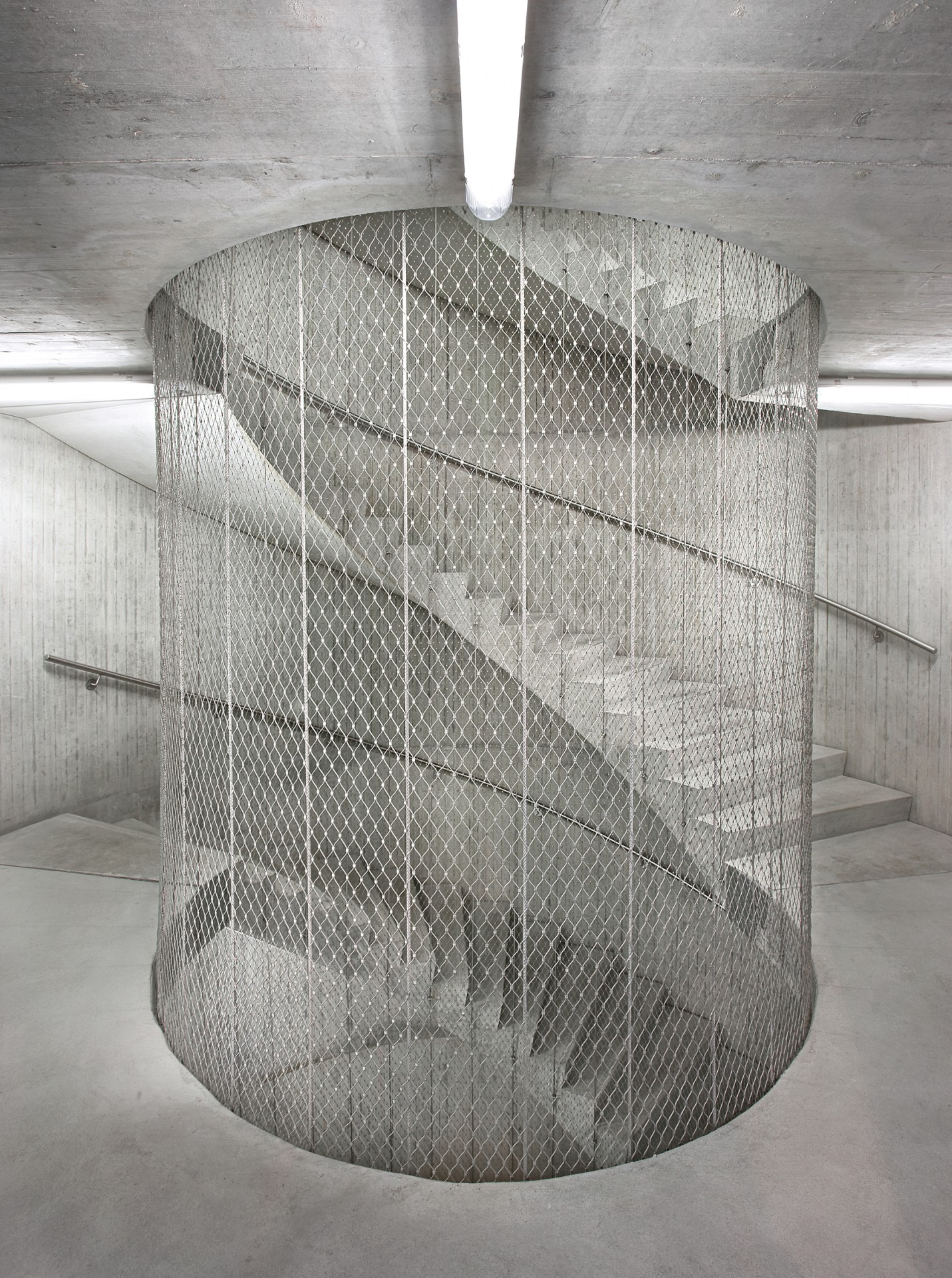 round staircase secured with webnet stainless steel wire mesh